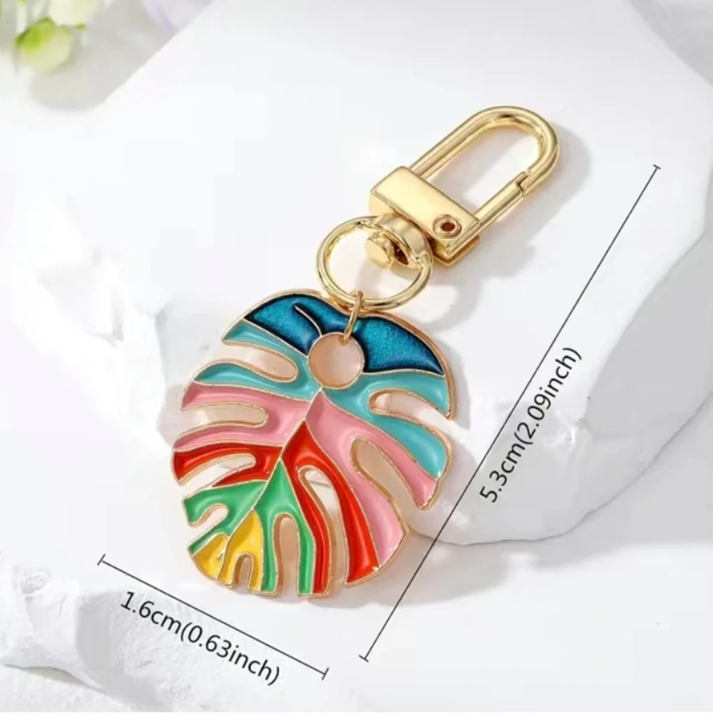 RAINBOW 🌈 MONSTERA KEYCHAIN NWT